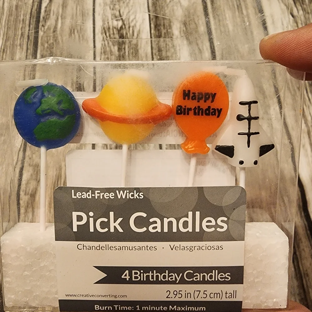 Space birthday party candles, Set of 4, Measures 2.95 inches tall per candle